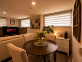Dining table and chairs — Cozy 1BR in Saint-Constant