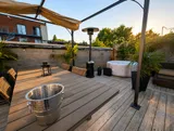 Shared terrace with outdoor seating — Cozy Luxury in the Plateau