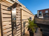 Wooden terrace and outdoor structure — Cozy Luxury in the Plateau