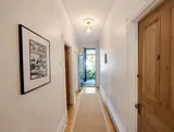 Additional interior view of the heritage two-bedroom stay — Cozy Heritage 2BR with Lush Private Garden Patio
