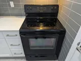 Electric stove and oven — Cozy Studio Near YUL