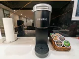 Coffee maker and drink supplies — Spacious 2BR Holiday Home Near YUL