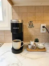 Coffee maker and drink supplies — Stylish Getaway 3BR with Heated Pool