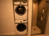 In-unit laundry area — Luxury 2BR Plateau Stay