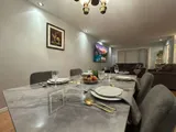 Dining table and chairs — Stylish Getaway 3BR with Heated Pool
