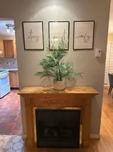 Fireplace surround and room decor — Stylish Getaway 3BR with Heated Pool