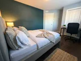 Bedroom with dedicated desk and chair — Modern 1BR with Desk Near YUL