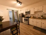 Kitchen and dining table — Cozy Luxury in the Plateau