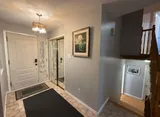Entry hall with mirrored closet — Stylish Getaway 3BR with Heated Pool
