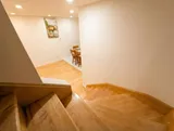 Interior stairs and handrail — Spacious 2BR Holiday Home Near YUL