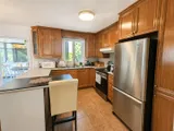 Full kitchen — Spacious 3BR Home with Private Backyard