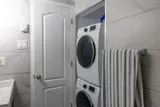 Stacked washer and dryer — Rehoboth 1BR in Laval