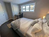 Bedroom with dedicated desk and chair — Modern 1BR with Desk Near YUL