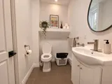 Bathroom sink and toilet — Luxury 2BR in the Plateau