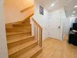 Interior stairs and handrail — Spacious 2BR Holiday Home Near YUL