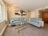 Comfortable living room seating area — Bright 2BR Retreat