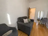 Quiet library workspace in the apartment — Cozy Heritage 2BR with Lush Private Garden Patio