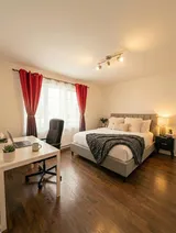Bedroom with dedicated desk and chair — Modern 1BR with Private Bath