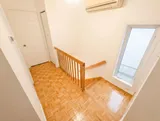 Interior stairs and handrail — Spacious 2BR Holiday Home Near YUL