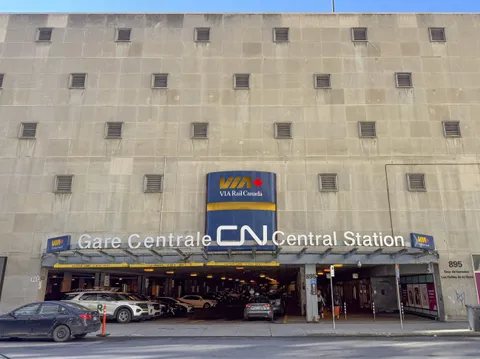 Entrance to Montréal Central Station on De La Gauchetière Street, with VIA Rail signage