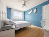 First bedroom — Spacious 3BR Home with Private Backyard