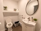 Bathroom sink and toilet — Luxury 2BR in the Plateau
